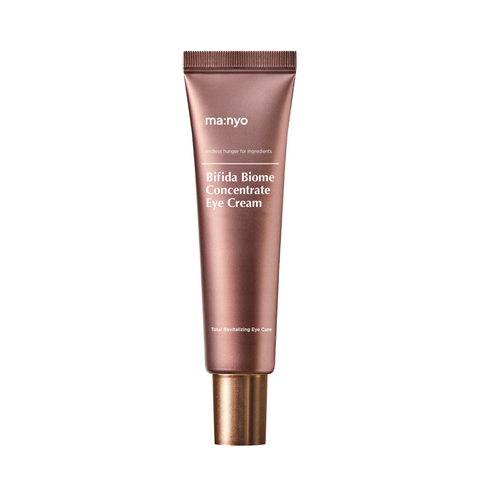 ma:nyo's Bifida Biome Concentrate Eye Cream in a sleek, luxurious copper tube. 