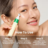 Smiling woman applying eye serum using a CoolTouch metal applicator. Instructions below detail how to use: 1. Pump the product, 2. Apply with applicator, 3. Massage with circular motion.