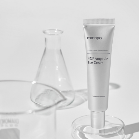 ma:nyo's 4GF Ampoule Eye Cream in the center with laboratory flasks behind the product.  